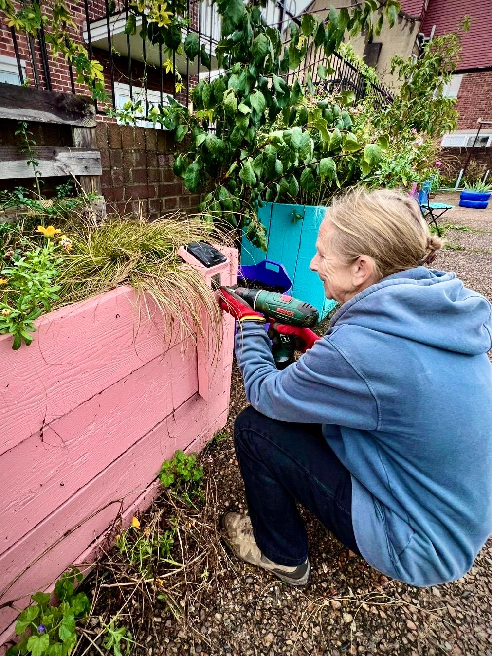 Woman fixing nature trail