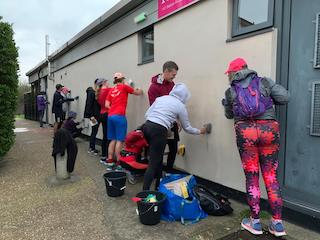 Nursery wall mural – GoodGym volunteers scrubbing and preparing it: