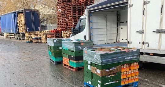 On site picking up 3 pallets ready to be delivered to the food bank
