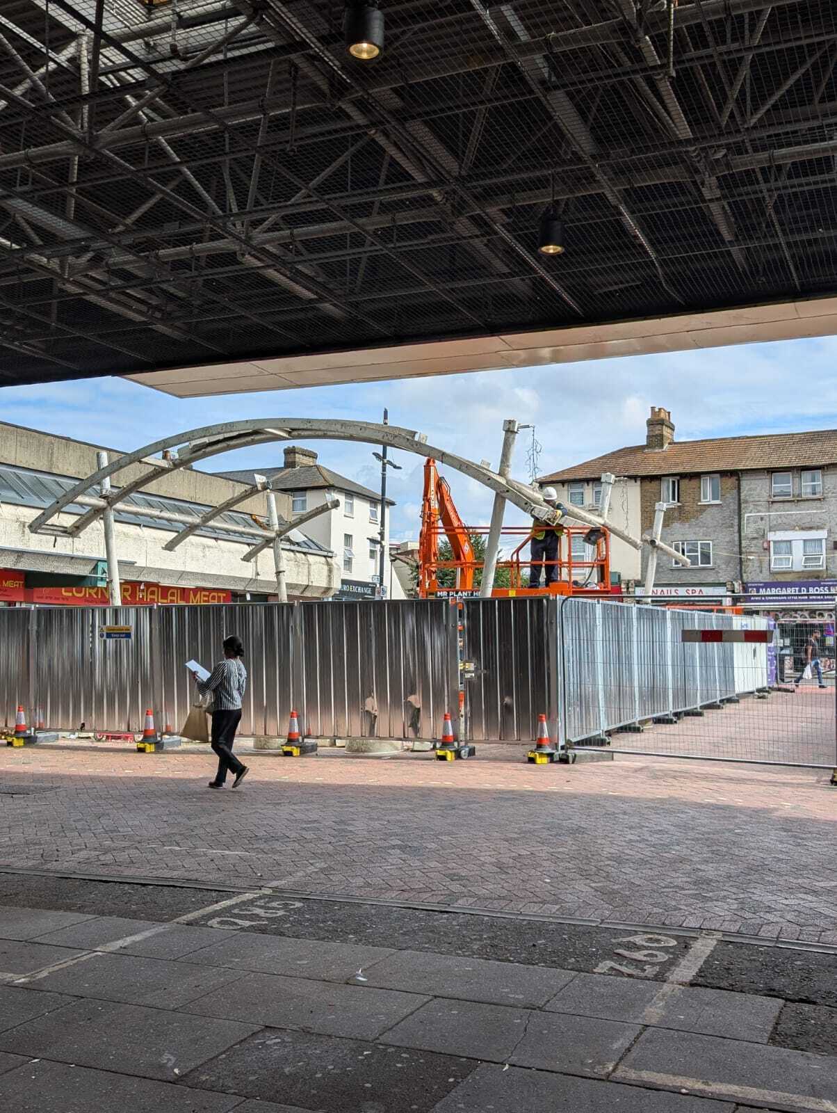 Old canopies at Queen's Market being demolished.