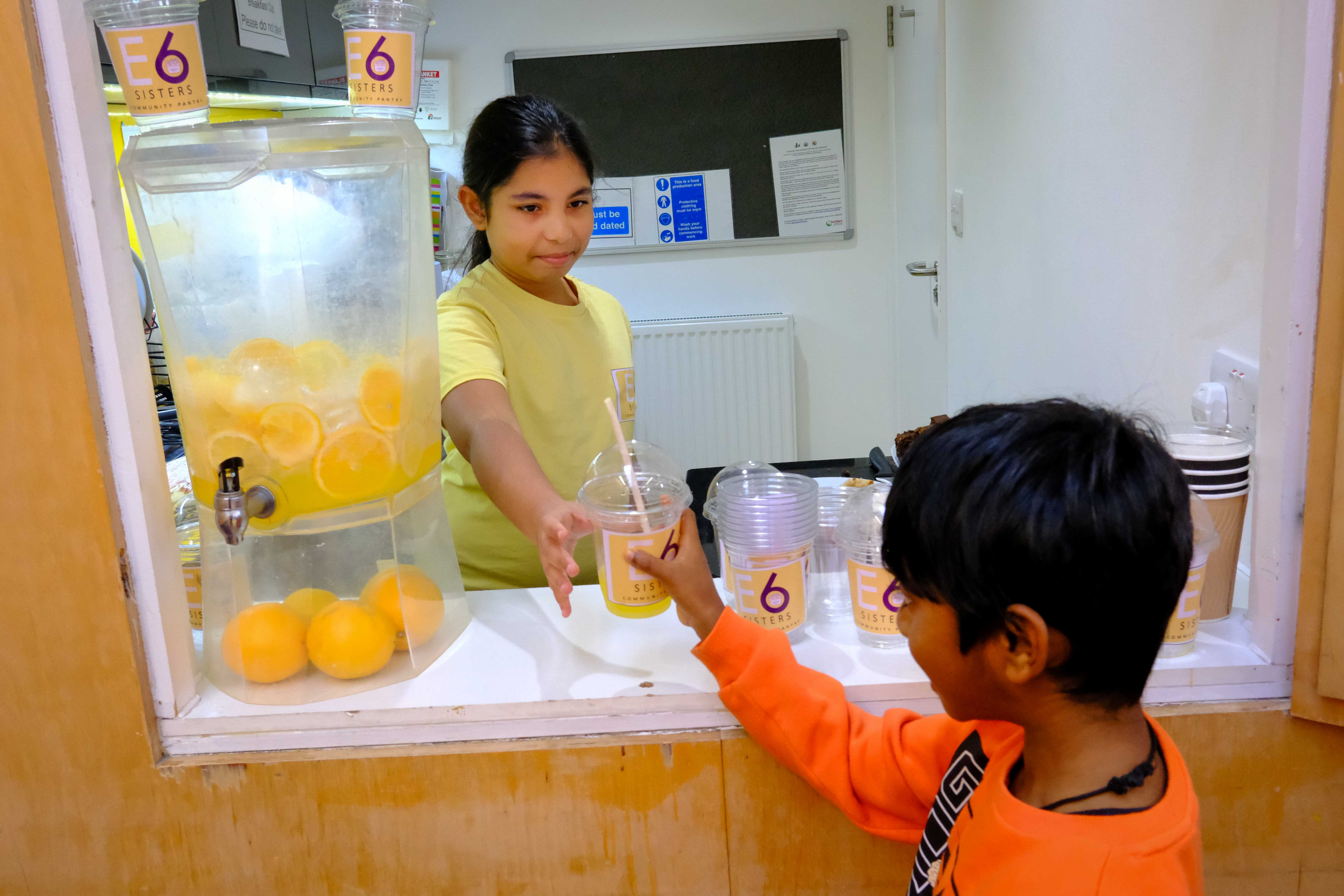 Children helping at the Community Pantry