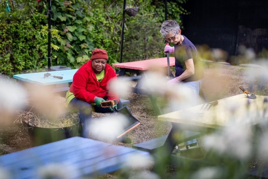 Two volunteers clearing up